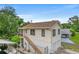House exterior showcasing a two-story home with a detached garage at 1501 28Th N Ave, St Petersburg, FL 33704