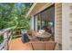 Private deck with wicker furniture and view of the surrounding trees at 1501 28Th N Ave, St Petersburg, FL 33704