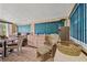 Bright sunroom with multiple windows and relaxing seating at 1501 28Th N Ave, St Petersburg, FL 33704