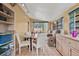 Sunroom with ample natural light, comfortable seating and storage at 1501 28Th N Ave, St Petersburg, FL 33704