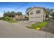 Tan house with a two-car garage and a large backyard at 1501 28Th N Ave, St Petersburg, FL 33704