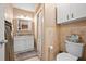 Clean bathroom with shower stall, toilet, and vanity with granite countertop at 1501 28Th N Ave, St Petersburg, FL 33704