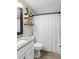 Clean bathroom with granite countertop and white vanity at 3124 Lecanto St, Holiday, FL 34691