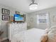 Serene bedroom with a large dresser and comfortable bed at 3124 Lecanto St, Holiday, FL 34691