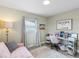 Bright home office with a desk and comfortable seating at 3124 Lecanto St, Holiday, FL 34691