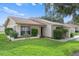 Exterior view of the house with landscaping at 3849 Staysail Ln, Holiday, FL 34691