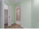 White closet with bi-fold doors and wire shelving at 3849 Staysail Ln, Holiday, FL 34691