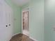 White closet with bi-fold doors and wire shelving at 3849 Staysail Ln, Holiday, FL 34691