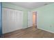 Bedroom with double closets and access to another room at 3849 Staysail Ln, Holiday, FL 34691