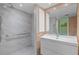 Updated bathroom featuring marble shower and vanity at 3849 Staysail Ln, Holiday, FL 34691