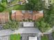 Aerial view of townhouses and surrounding landscape at 3849 Staysail Ln, Holiday, FL 34691