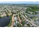 Wide aerial view of community and surrounding area at 3849 Staysail Ln, Holiday, FL 34691
