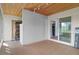 Bright, tiled screened porch with sliding glass doors and ample space at 3849 Staysail Ln, Holiday, FL 34691