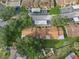 Aerial view of townhouses, landscape, and parking at 3849 Staysail Ln, Holiday, FL 34691