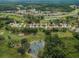 Aerial view of community near golf course at 9727 Oakwood Hills Ct, New Port Richey, FL 34655