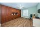 Home office with built-in wooden cabinetry and window at 9727 Oakwood Hills Ct, New Port Richey, FL 34655