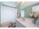 Simple bathroom with shower/tub combo at 9727 Oakwood Hills Ct, New Port Richey, FL 34655