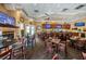 Relaxing clubhouse bar with TVs and seating at 9727 Oakwood Hills Ct, New Port Richey, FL 34655