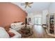 Living room with comfy sofas, wood floors, and high ceilings at 9727 Oakwood Hills Ct, New Port Richey, FL 34655