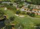 Aerial view of houses and golf course at 9727 Oakwood Hills Ct, New Port Richey, FL 34655