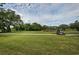 Golf course view with cart path and lush green fairways at 9727 Oakwood Hills Ct, New Port Richey, FL 34655