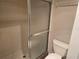 Bathroom features a tiled shower and a modern toilet for a clean and functional space at 5265 E Bay Dr # 420, Clearwater, FL 33764