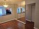 Open living room with view to kitchen and dining area at 5265 E Bay Dr # 420, Clearwater, FL 33764