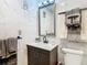 Modern bathroom with marble tile and updated vanity at 11836 Carissa Ln # B, New Port Richey, FL 34654