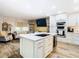 Open kitchen with large island, wine cooler, and stainless steel appliances at 11836 Carissa Ln # B, New Port Richey, FL 34654