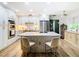 Gourmet kitchen boasts stainless steel appliances, quartz countertops, and an island at 11836 Carissa Ln # B, New Port Richey, FL 34654