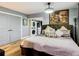 Spacious main bedroom with king-size bed and en-suite laundry at 11836 Carissa Ln # B, New Port Richey, FL 34654
