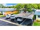 Aerial view of condo with carport and landscaping at 11836 Carissa Ln # B, New Port Richey, FL 34654