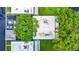 Overhead view of residential building tops, landscaping, and parking at 11836 Carissa Ln # B, New Port Richey, FL 34654