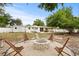 Fire pit area with seating and backyard view at 1108 66Th Nw St, Bradenton, FL 34209