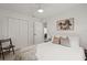 Bedroom with double bed, neutral tones and built-in closet at 1108 66Th Nw St, Bradenton, FL 34209