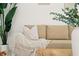 Beige couch with throw blanket and wooden coffee table at 1108 66Th Nw St, Bradenton, FL 34209