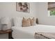 Bedroom with double bed, neutral tones and natural light at 1108 66Th Nw St, Bradenton, FL 34209