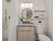 Modern bathroom with a walk-in shower, floating shelves, and stylish fixtures at 1108 66Th Nw St, Bradenton, FL 34209