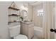 Modern bathroom with a bathtub, granite countertop, and stylish fixtures at 1108 66Th Nw St, Bradenton, FL 34209