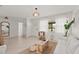 Open living room with modern decor and an abundance of natural light at 1108 66Th Nw St, Bradenton, FL 34209
