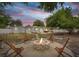 Evening view of fire pit and backyard at 1108 66Th Nw St, Bradenton, FL 34209