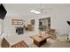 Open concept game room with pool table and seating area at 1108 66Th Nw St, Bradenton, FL 34209