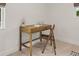Cozy study area with a wooden desk, chair, and decorative accents at 1108 66Th Nw St, Bradenton, FL 34209