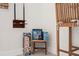 Well-organized game closet with various board games and a wooden stool at 1108 66Th Nw St, Bradenton, FL 34209