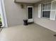 Small front patio with door and window at 5265 E Bay Dr # 420, Clearwater, FL 33764