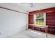 Bedroom with built-in shelving and window seat at 9108 Bassett Ln # B, New Port Richey, FL 34655