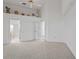 Primary bedroom with walk-in closet and access to bathroom at 9108 Bassett Ln # B, New Port Richey, FL 34655