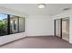 Sunroom with sliding door access to backyard at 9108 Bassett Ln # B, New Port Richey, FL 34655