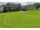 Aerial view of green golf course at 9108 Bassett Ln # B, New Port Richey, FL 34655