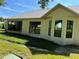 Well-maintained exterior with lush landscaping at 9108 Bassett Ln # B, New Port Richey, FL 34655